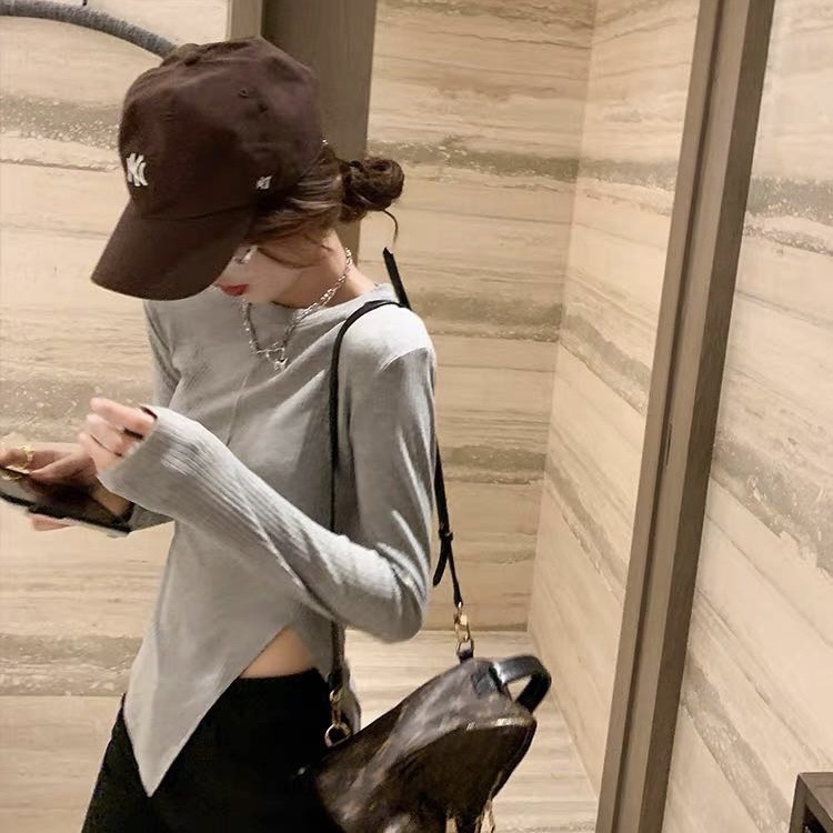 特价早春新款 韩版休闲设计感垫肩开叉长袖T恤  #AL