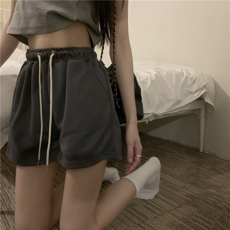 Actual shot of new casual sports shorts, loose high-waisted pants for women