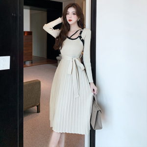 Waist pleated knitted dress with middle length and skirt underneath