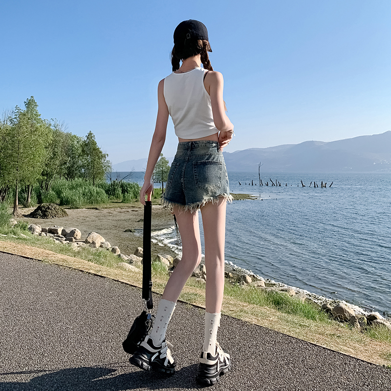 2023年夏季新款復古牛仔短褲女韓版做舊毛邊高腰辣妹闊腿A字熱褲