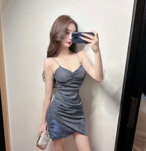 V-neck strap low cut dress with slim fit pleated buttocks and irregular short skirt