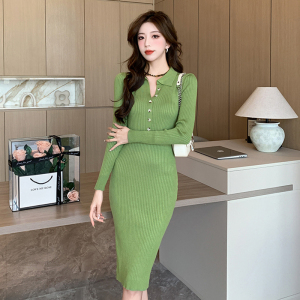 High end luxury mid length sweater with tight fitting buttocks skirt