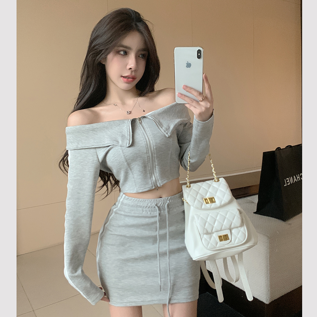 One-shoulder sports and leisure college suit all-match American style bag hip hot girl skirt drawstring two-piece set