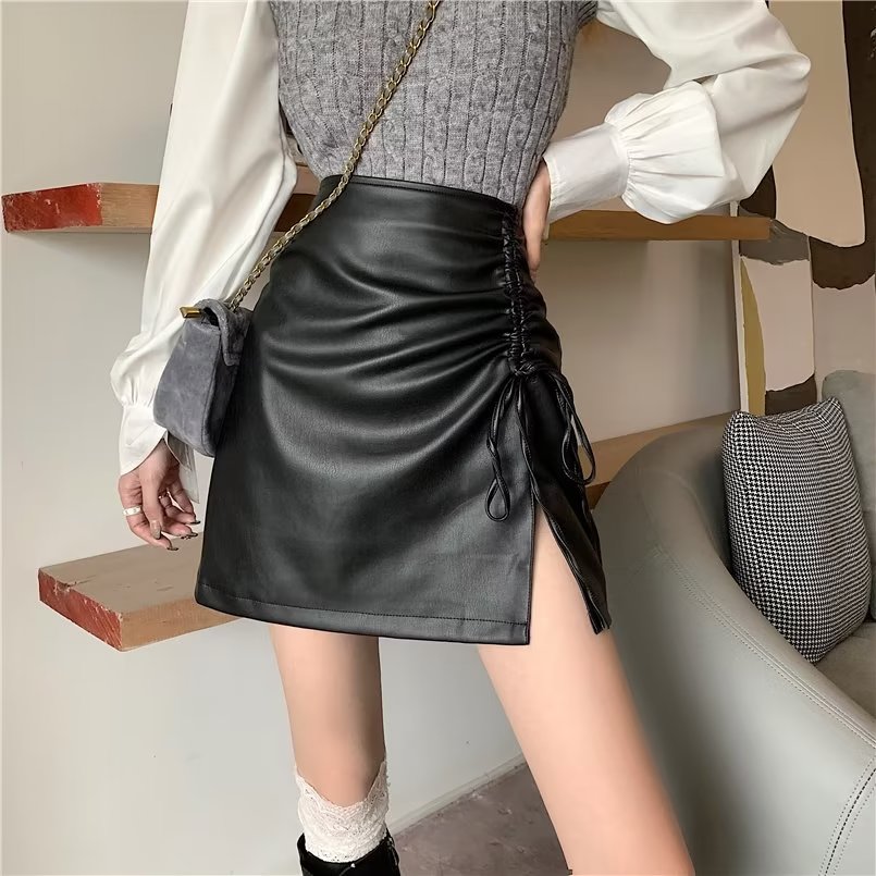 Large size black leather skirt skirt for women in spring and autumn fat MM design drawstring slit hip skirt high waist A-line short skirt