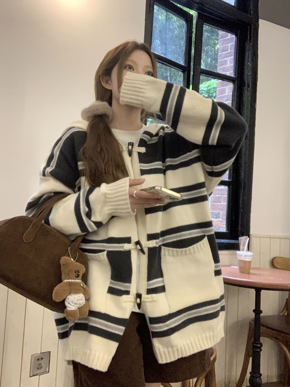 Actual shot of three-label striped hooded horn button lazy sweater jacket for women