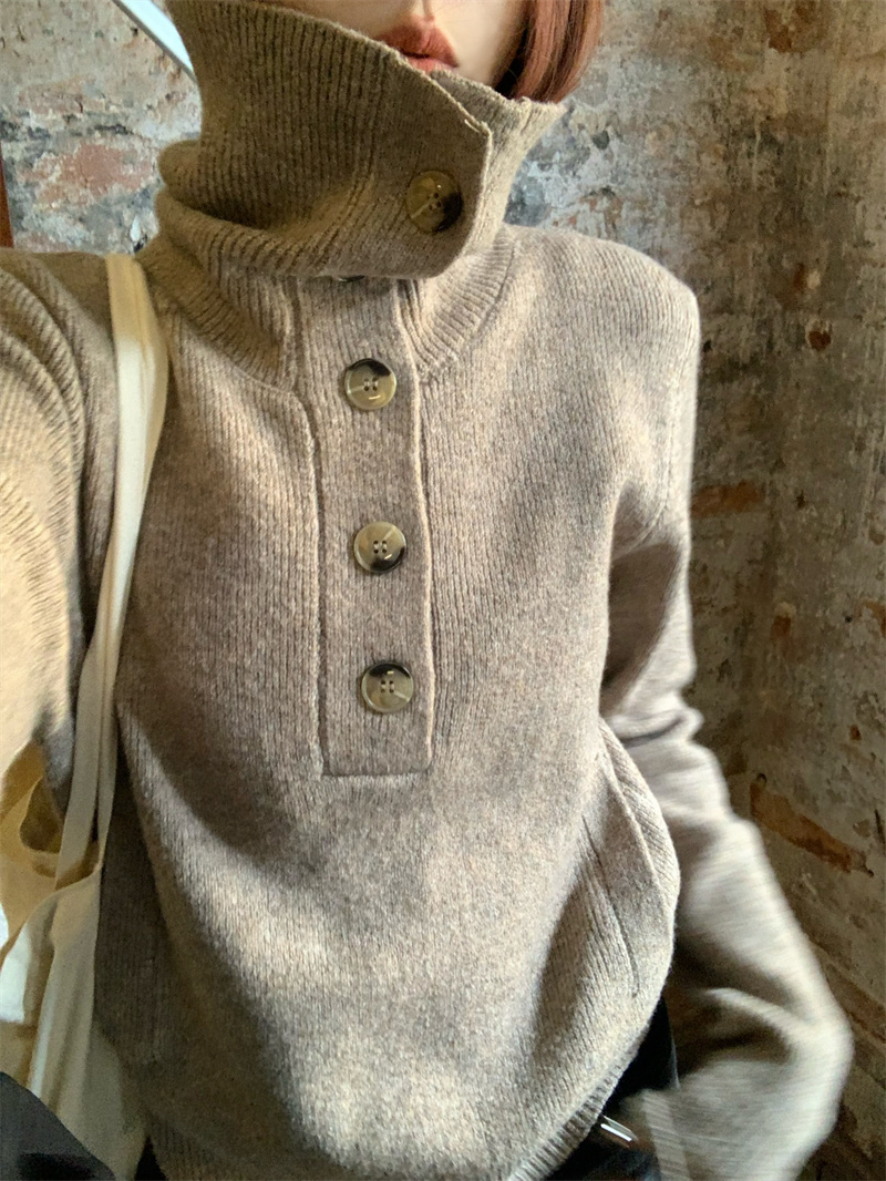 Actual shot of versatile design, slim short knitted sweater with high collar and buttons