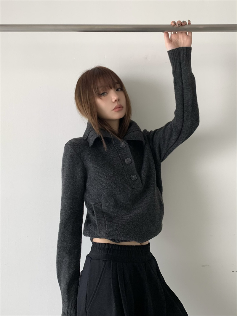 Actual shot of versatile design, slim short knitted sweater with high collar and buttons