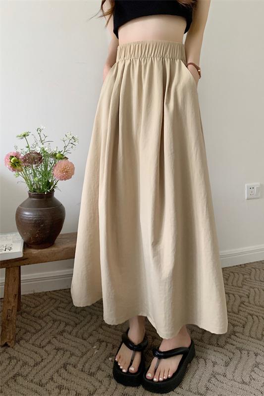 Actual shot of lazy style high-waisted A-line skirt, spring and summer casual and versatile mid-length skirt trendy