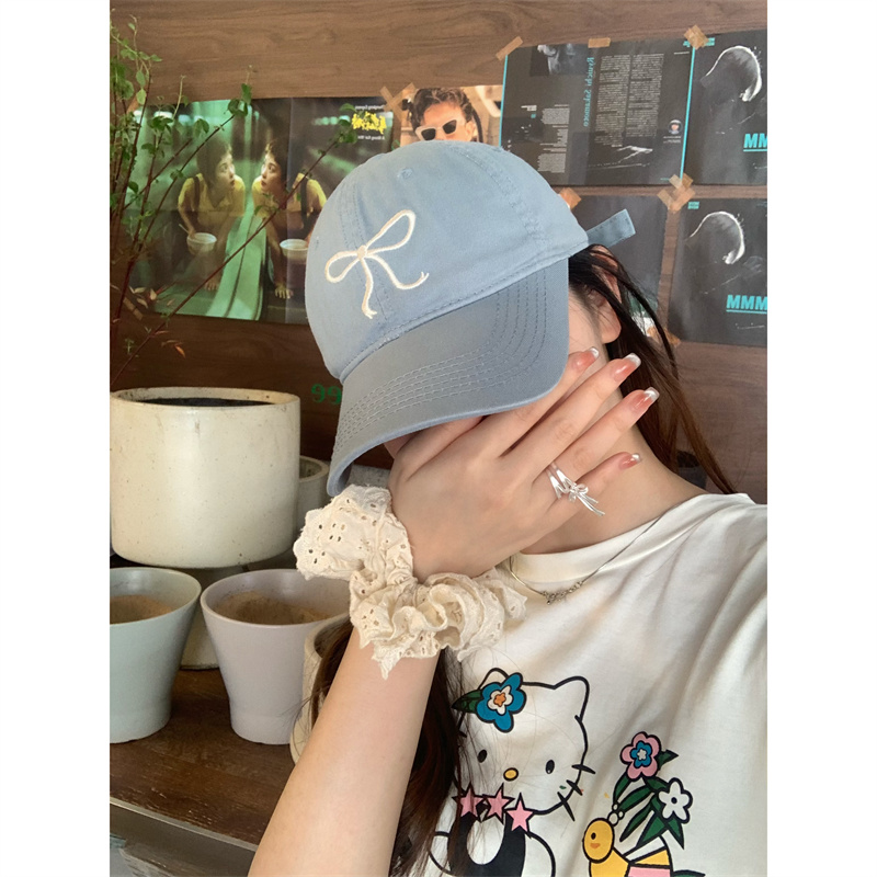 Real shot of bow embroidered peaked cap for women showing face and small ins Korean designer baseball sun protection hat