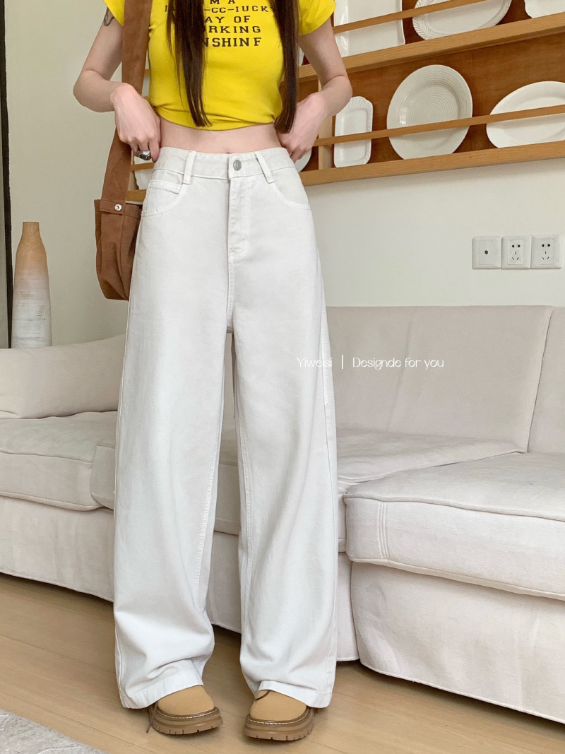 Actual shot of early spring loose wide-leg washed cotton straight floor-length denim trousers