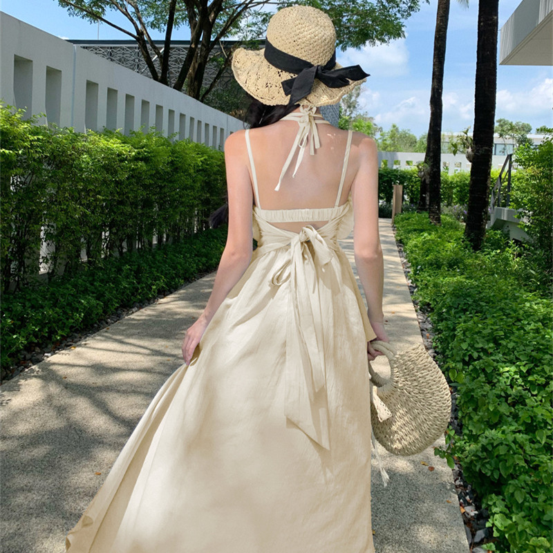 海邊度假藍色杏色溫柔風吊帶連衣裙夏季小眾長裙子有領花