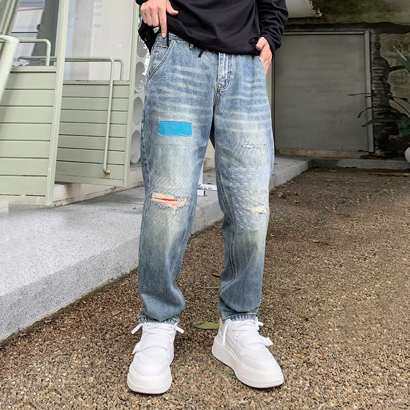 實拍2024秋冬新款破洞牛仔褲男寬松錐形哈倫補丁刺繡百搭潮牌褲子
