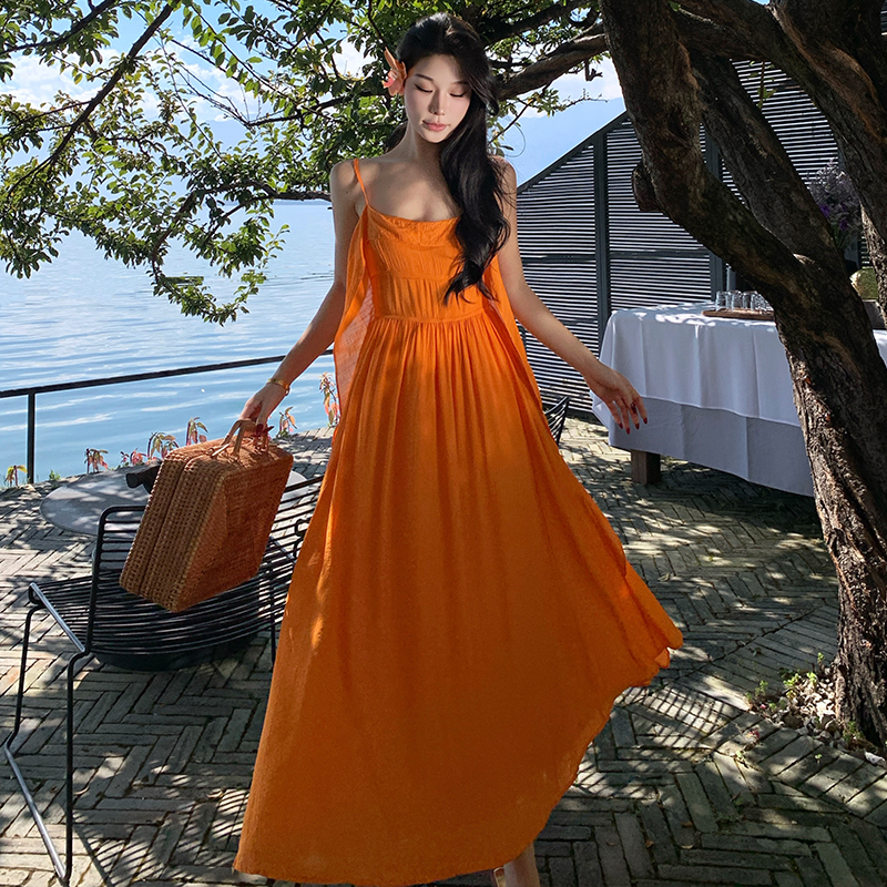 實拍橙色吊帶A字連衣裙夏季多巴胺度假絕美氣質收腰長裙子