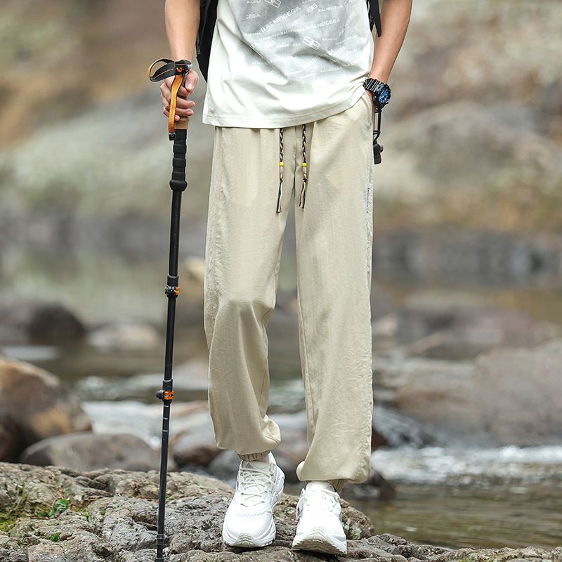 實拍夏季微皺垂感休閑運動褲男束腳松緊腰冰絲速干薄款休閑褲