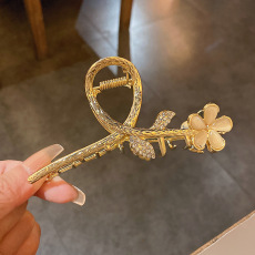 批发实拍轻奢小众高级猫眼石大号花朵抓夹盘发后脑勺鲨鱼发夹