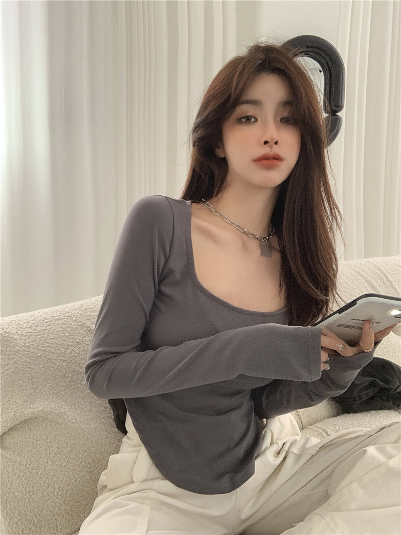 있음 선적 가을 의상 u 칼라 단색 섹시함 낮은 네크라인 불규칙 몸매 가꾸기 긴팔 티셔츠 여성