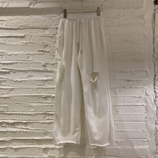 批发韩国东大门2026春夏女装新款时尚简约纯色松紧系带破洞磨边<b class='q'>休闲裤</b>