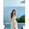 泰国三亚旅游拍照沙滩裙海边度假连衣裙纯欲性感镂空白色吊带长裙轮播图1