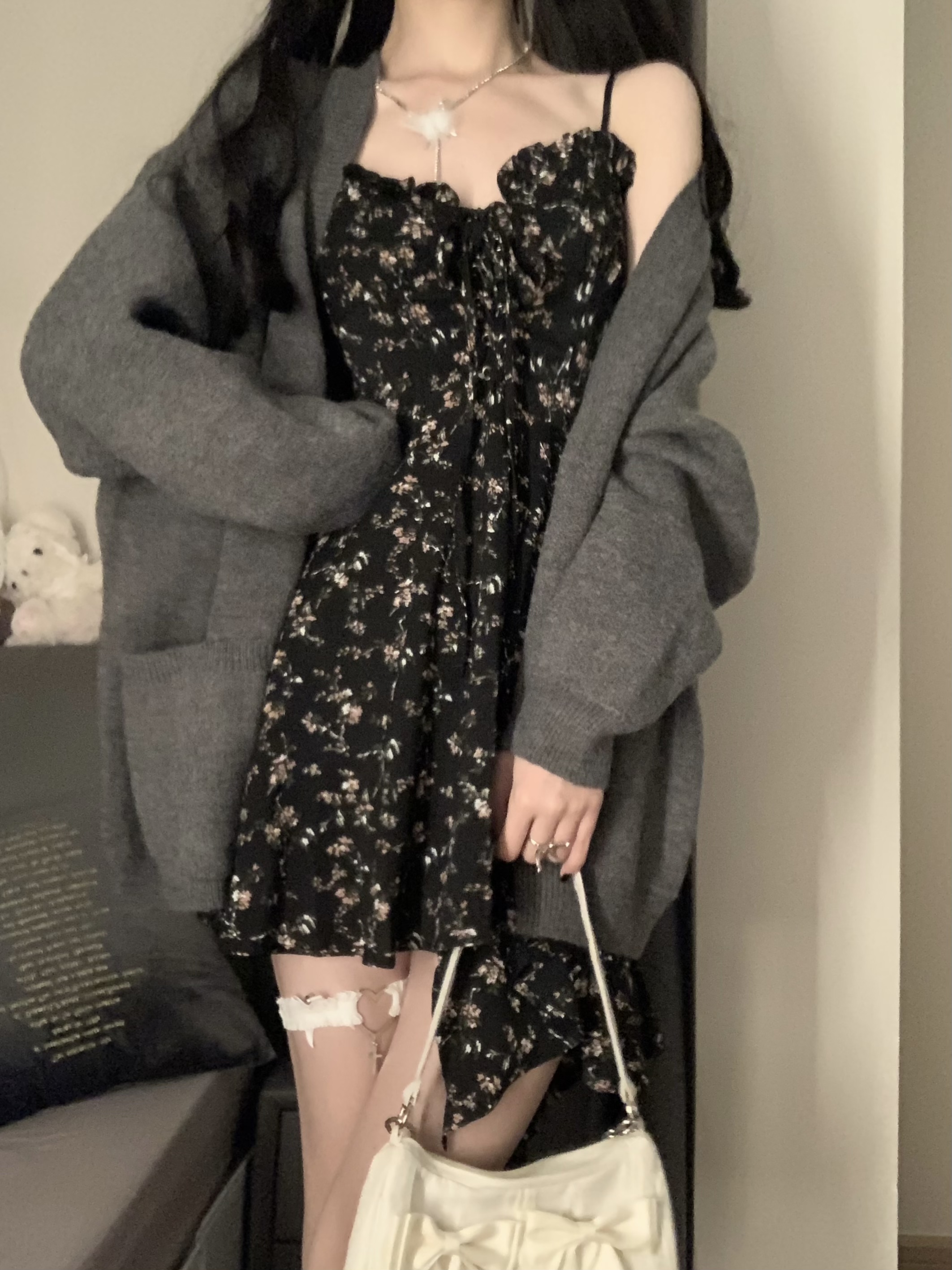 Real shot of a broken-looking beauty, pure lust floral suspender chiffon dress + lazy style knitted jacket