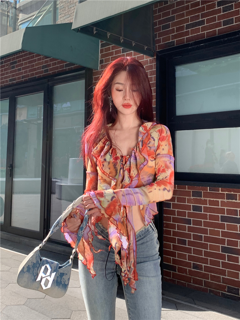 Actual shot of niche exotic retro abstract color-blocked flowing trumpet sleeve mesh top