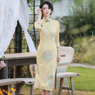 黄色旗袍改良2023年春季新款民国复古长袖年轻款少女高级感连衣裙