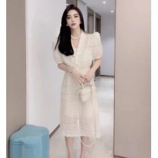 批发冰丝针织套装女2023夏时尚气质短款镂空针织衫+高腰半身裙两件套