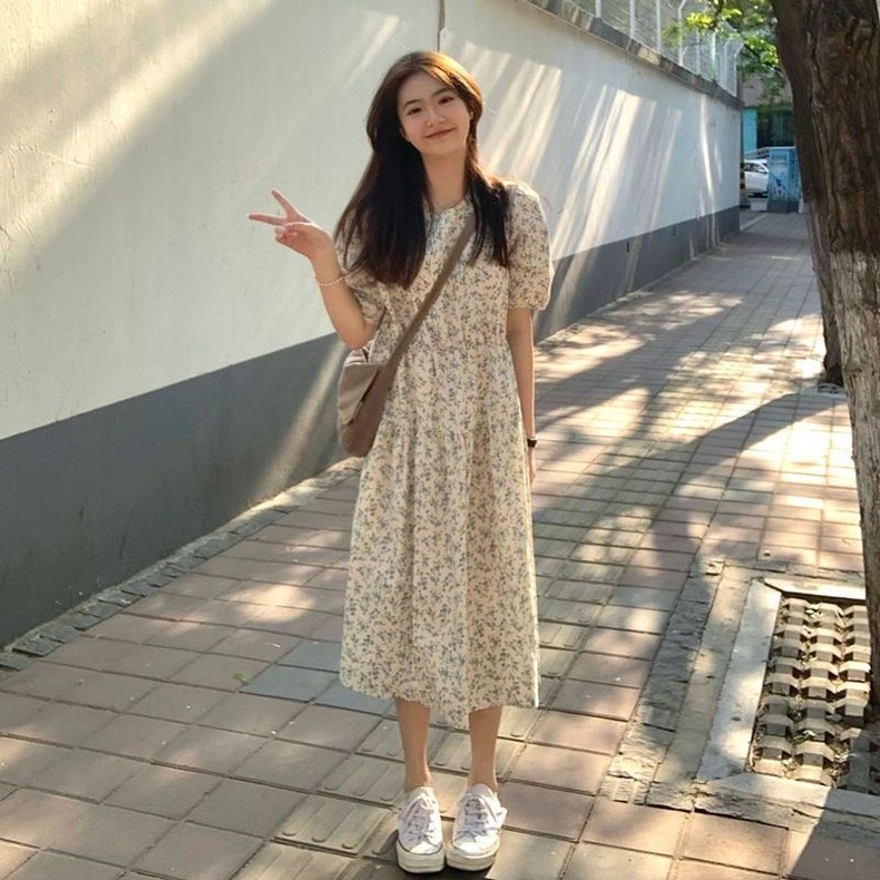 Summer 2024 new style beach holiday temperament floral dress platycodon tea break French long skirt women's spring wear