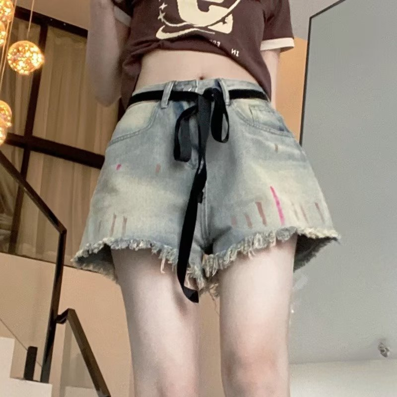Painted tassel raw edge jeans women's summer shorts ripped beggar pants design sense high waist beggar hot pants 2023