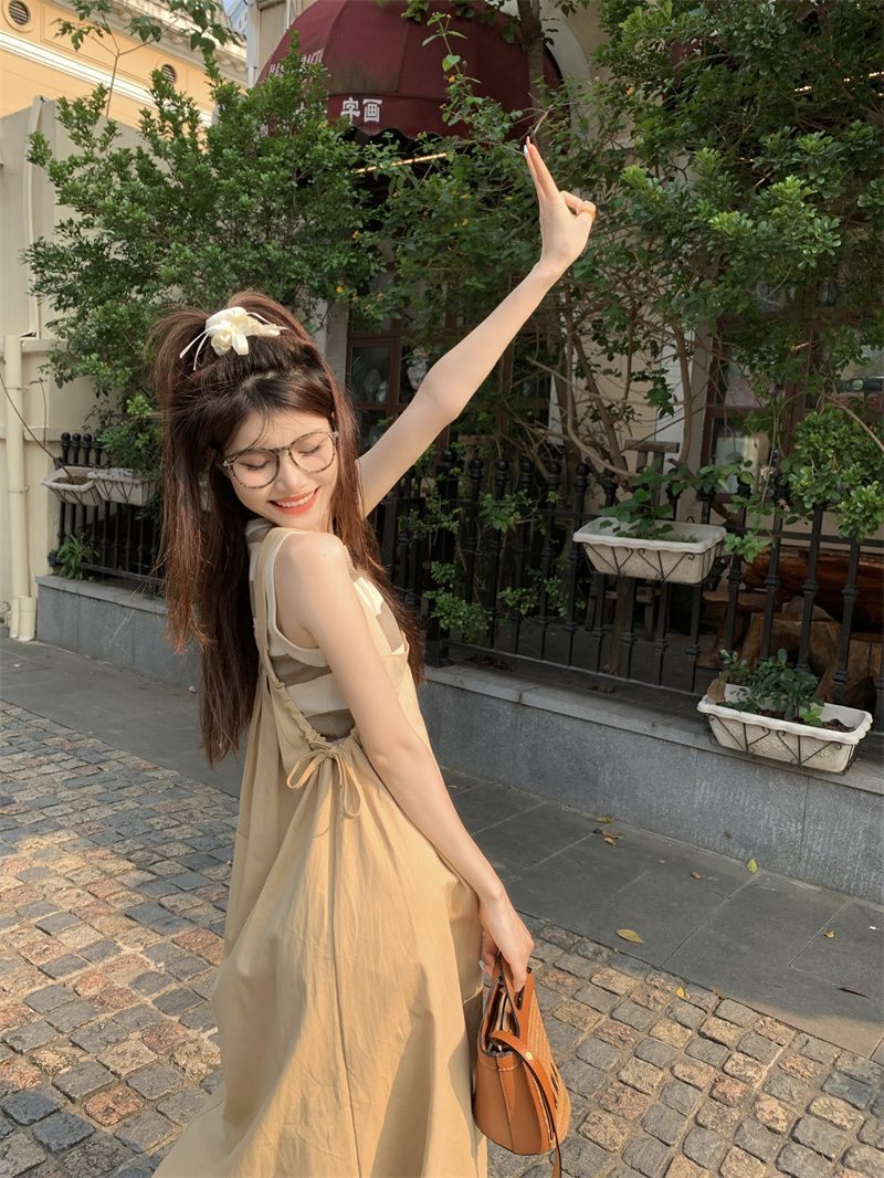 Strap dress women's summer 2023 new retro waist slimming mid-length design sense tie-up skirt