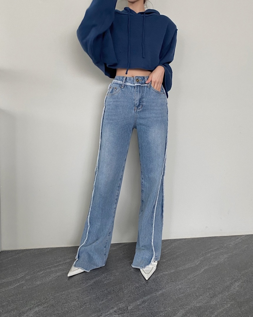 Raw slit paneled flared jeans