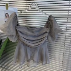 批发韩国东大门2026春夏新款淑女范气质纯色褶皱一字肩<b class='q'>泡泡袖</b>衬衫上衣