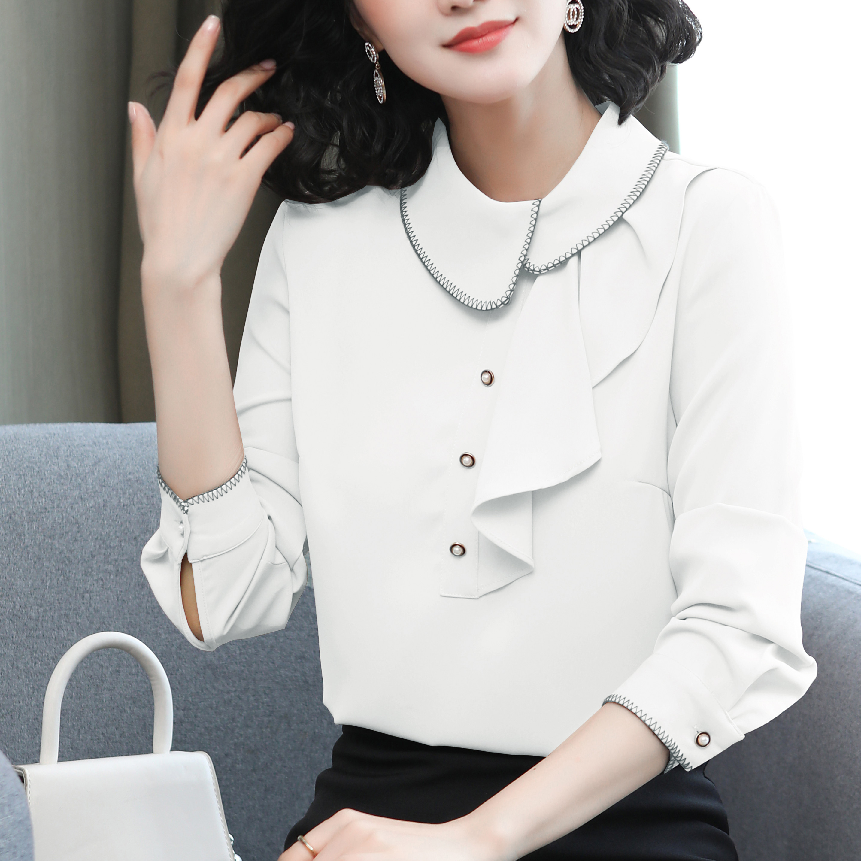 2026 봄 새로운 불규칙 프릴 고급 센스 맨위 디자인 센스 여성 셔츠 작은 대중 기본 셔츠