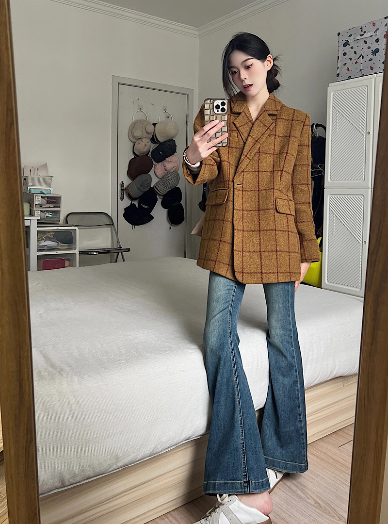 Real shot of retro woolen plaid suit jacket, classic British style simple suit