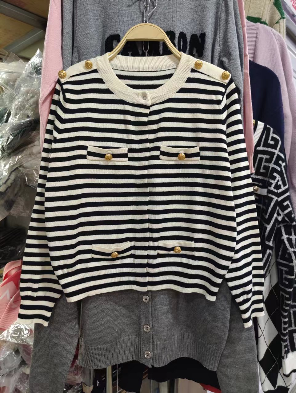 Qiu Tian's same style plain knitted cardigan 23 autumn new style French striped jacket top for women
