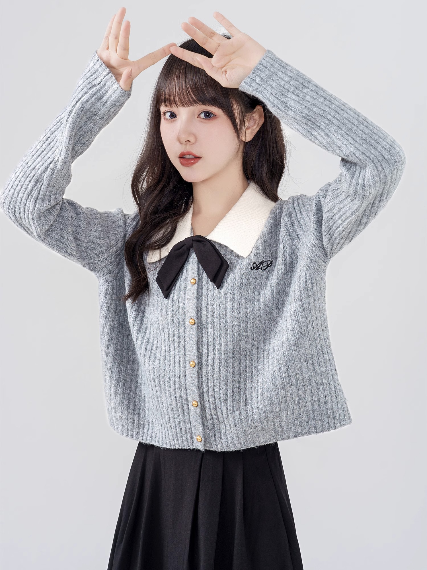 Bokaqi 2023 autumn and winter new lapel bow knitted cardigan women's college style niche contrast color short sweater