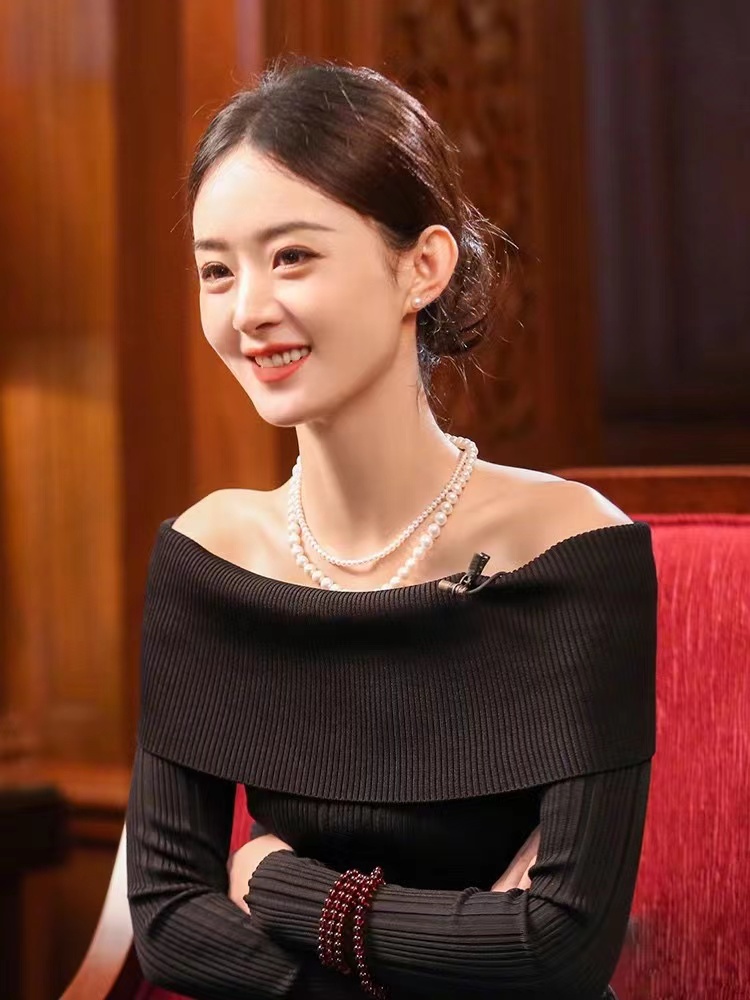 趙麗穎明星同款上衣女2023秋孔雪兒毛衣明星一字肩露肩黑色針織衫