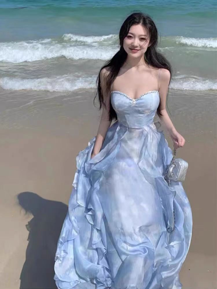 茶歇法式藍色吊帶連衣裙女夏季新款海邊度假沙灘長裙日落仙女裙子
