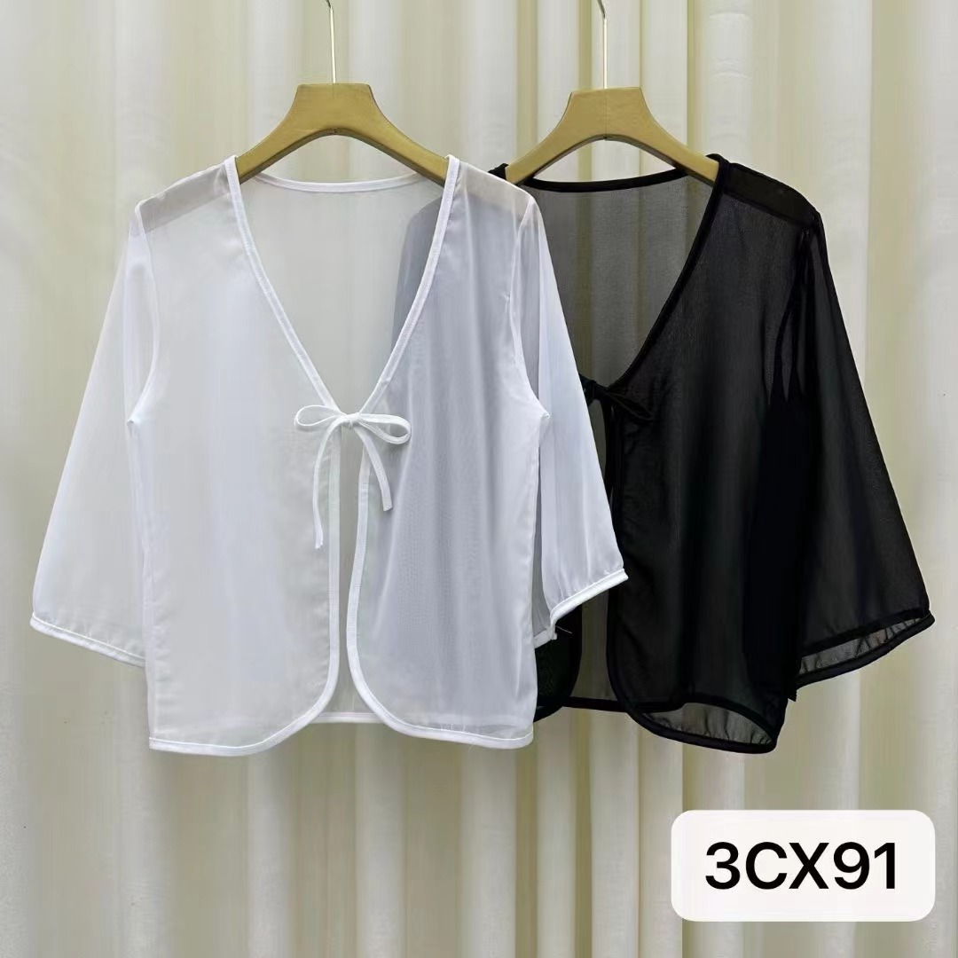 Shawl summer outer wear for women with suspender skirt. Thin and breathable new style versatile air-conditioning shirt top and small jacket.