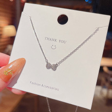 批发实拍简约小众设计感蝴蝶结吊坠钛钢项链女ins潮锁骨链