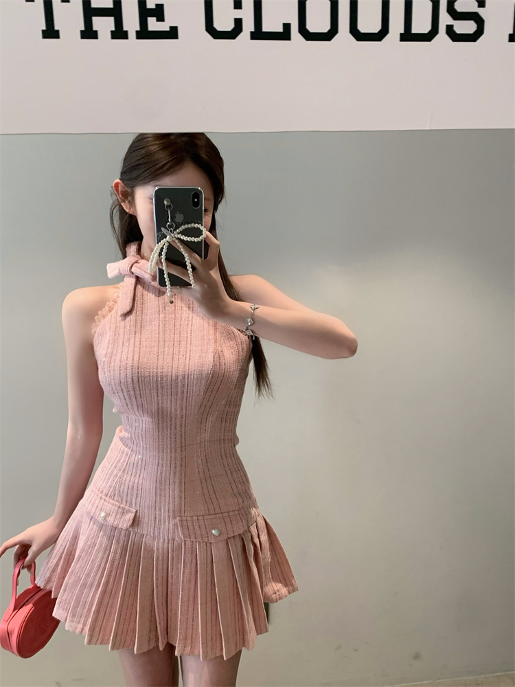 Actual shot of pink plaid halterneck dress with waist-slimming design and short skirt