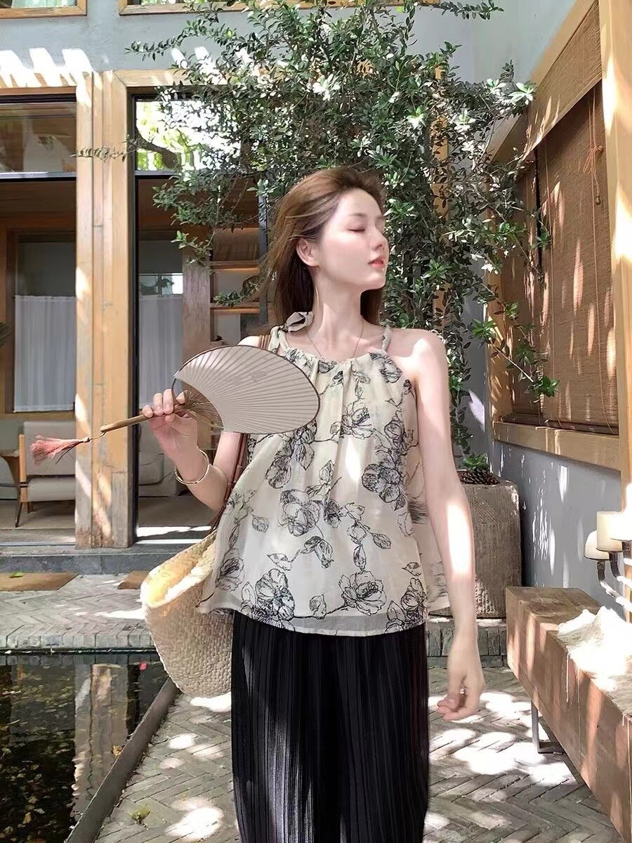 甜美法式溫柔系吊帶碎花連衣裙女夏季新款寬鬆慵懶顯瘦蓬蓬裙