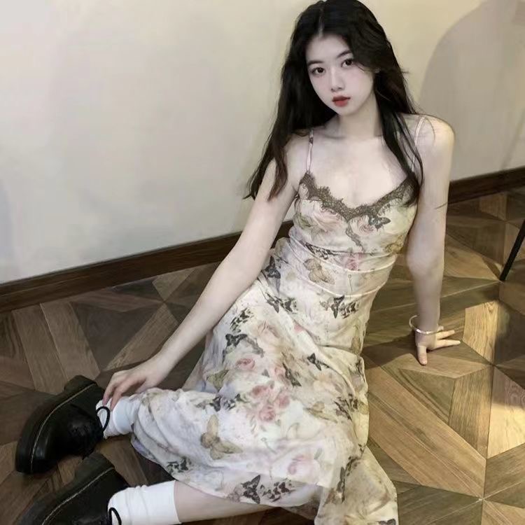 V-neck tea break French butterfly floral suspender dress women's summer 2024 new seaside vacation beach long dress