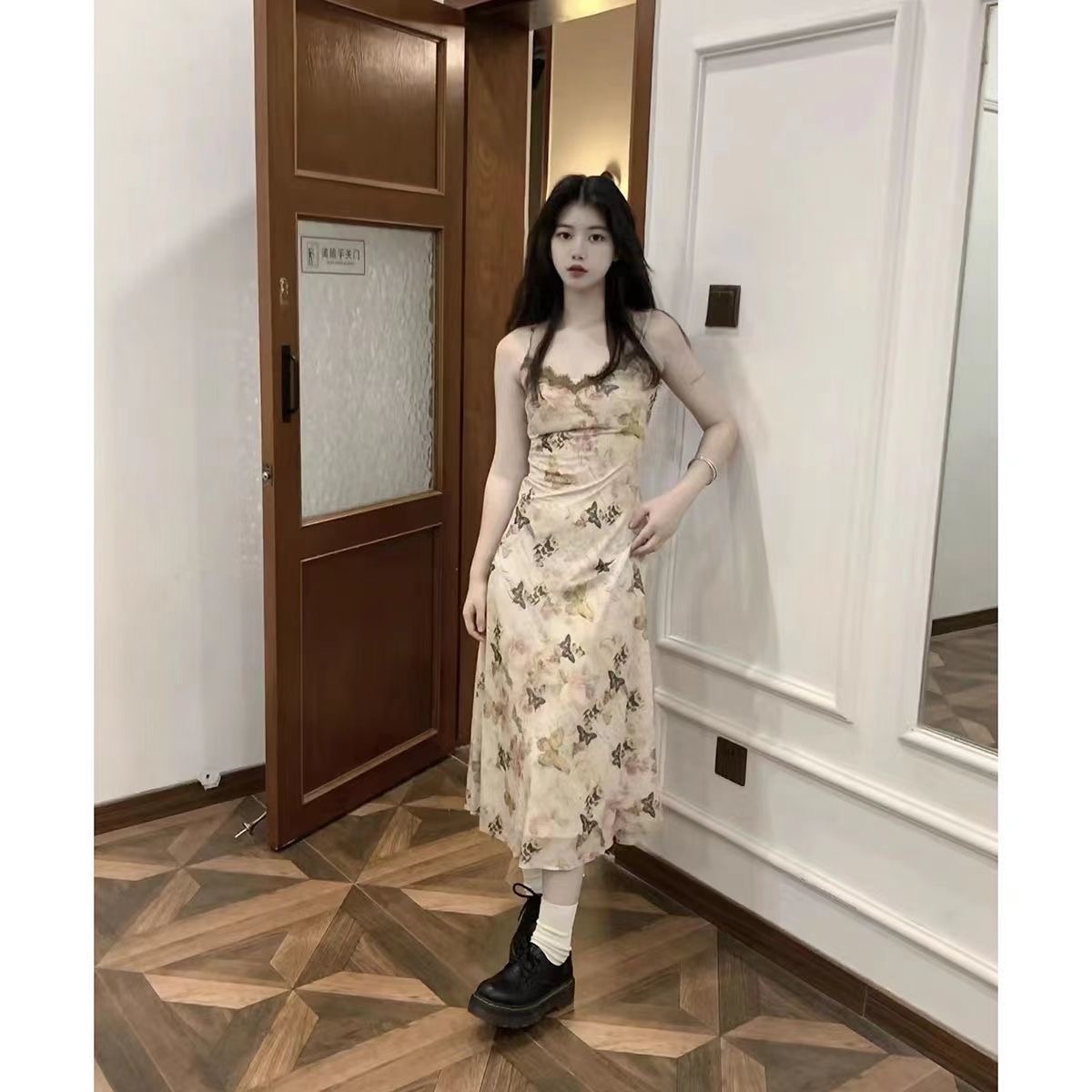 V-neck tea break French butterfly floral suspender dress women's summer 2024 new seaside vacation beach long dress