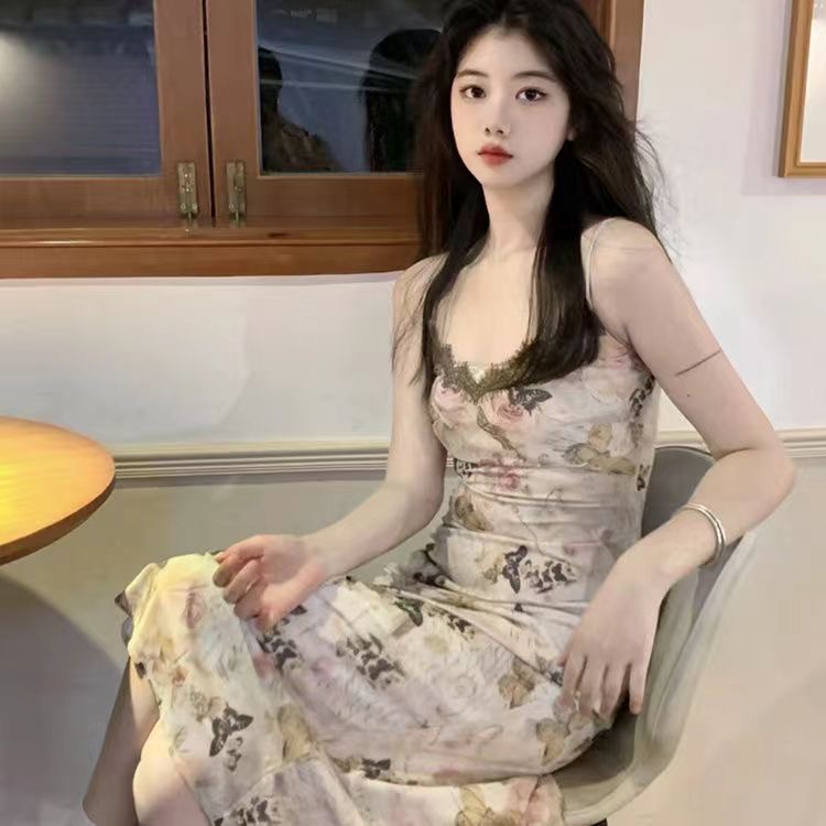 V-neck tea break French butterfly floral suspender dress women's summer 2024 new seaside vacation beach long dress