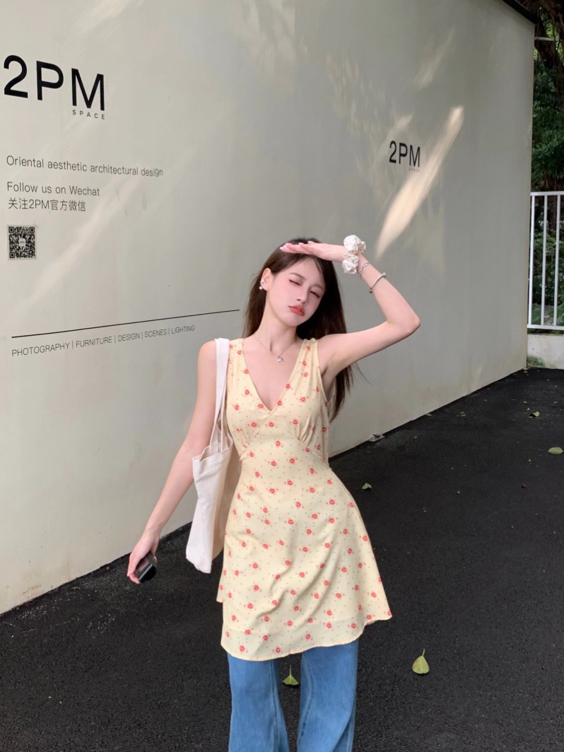 Actual shot of yellow large V-neck floral sleeveless strappy dress