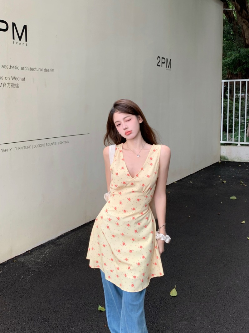 Actual shot of yellow large V-neck floral sleeveless strappy dress