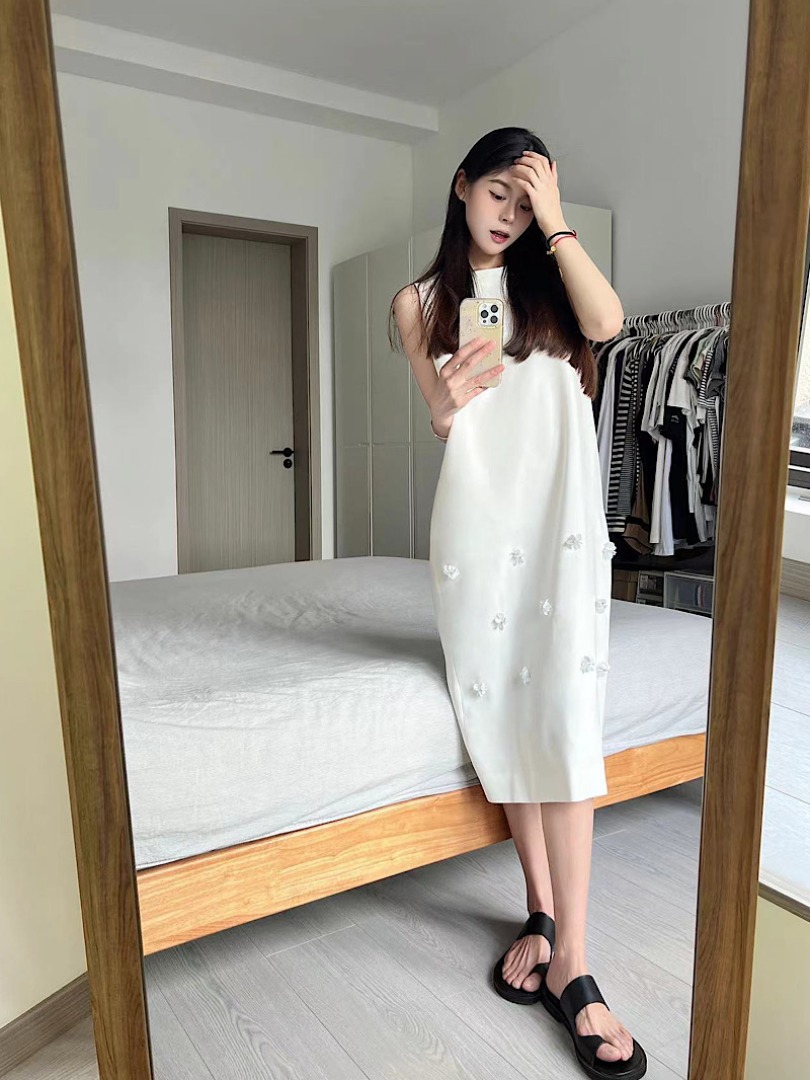 Actual shot of elegant beaded flowers, sleeveless long vest dress, little black dress, little white dress