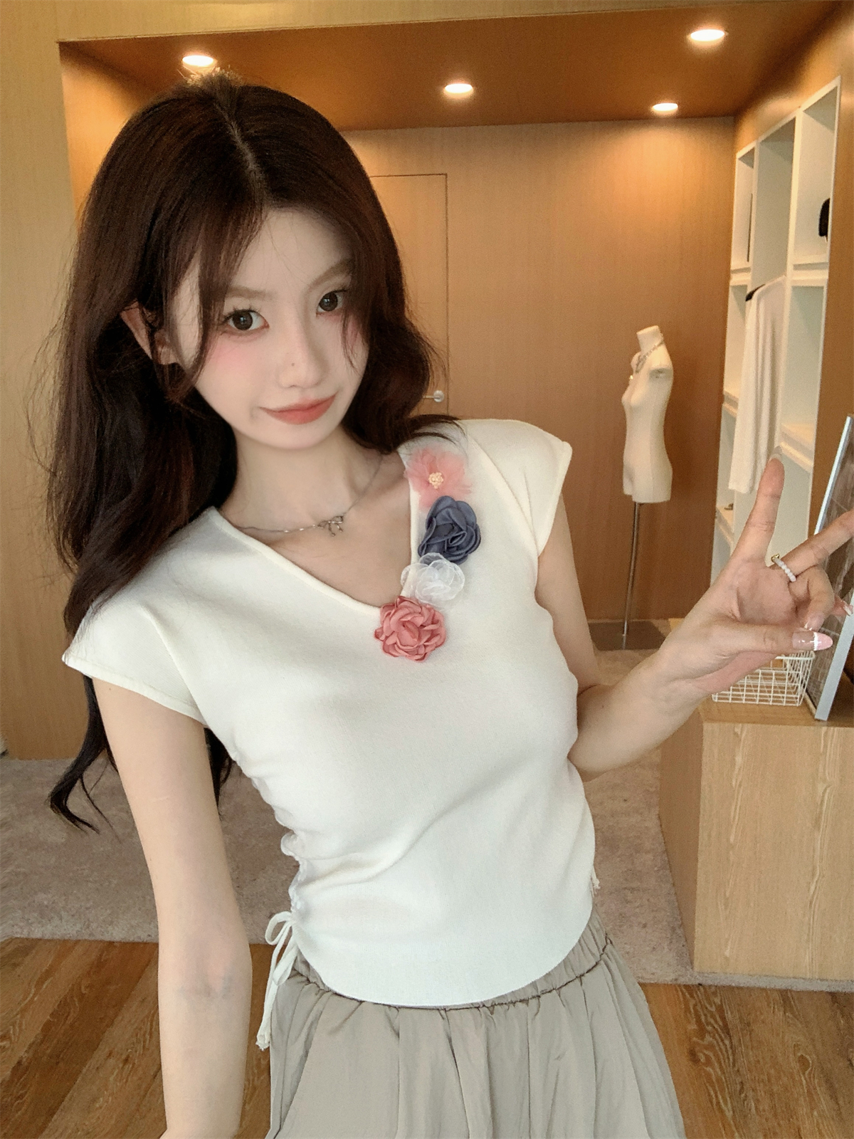 實拍 夏季韓版v領甜美花朵抽繩顯瘦設計感針織衫短袖上衣