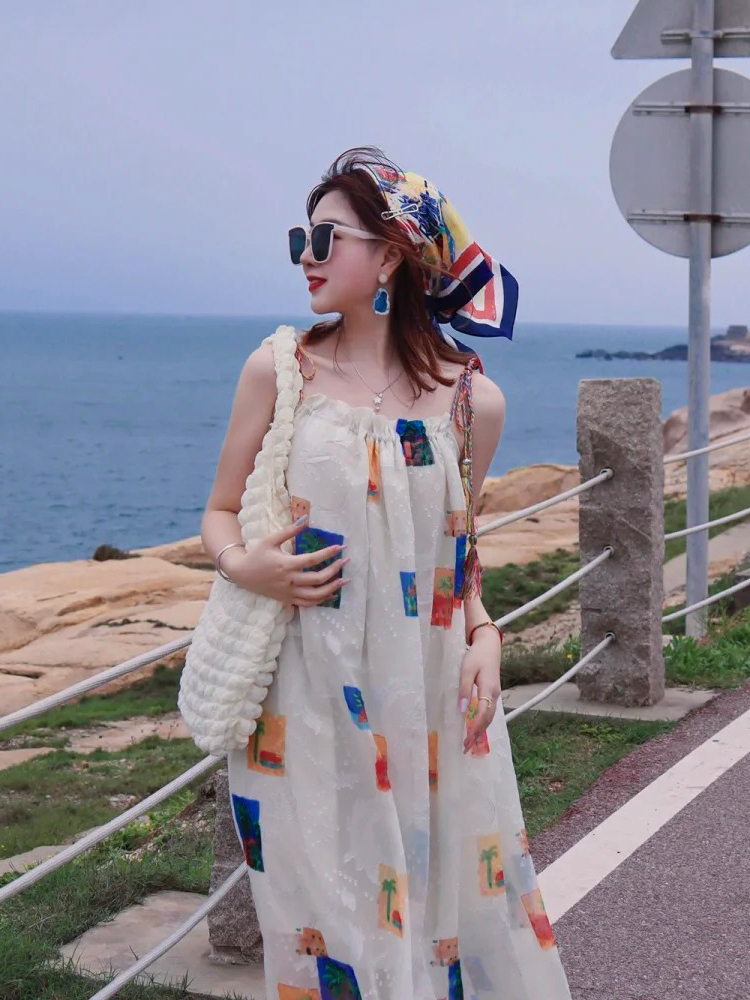 Tea break French high-end sexy seaside vacation floral suspender dress women's summer super fairy loose beach long dress