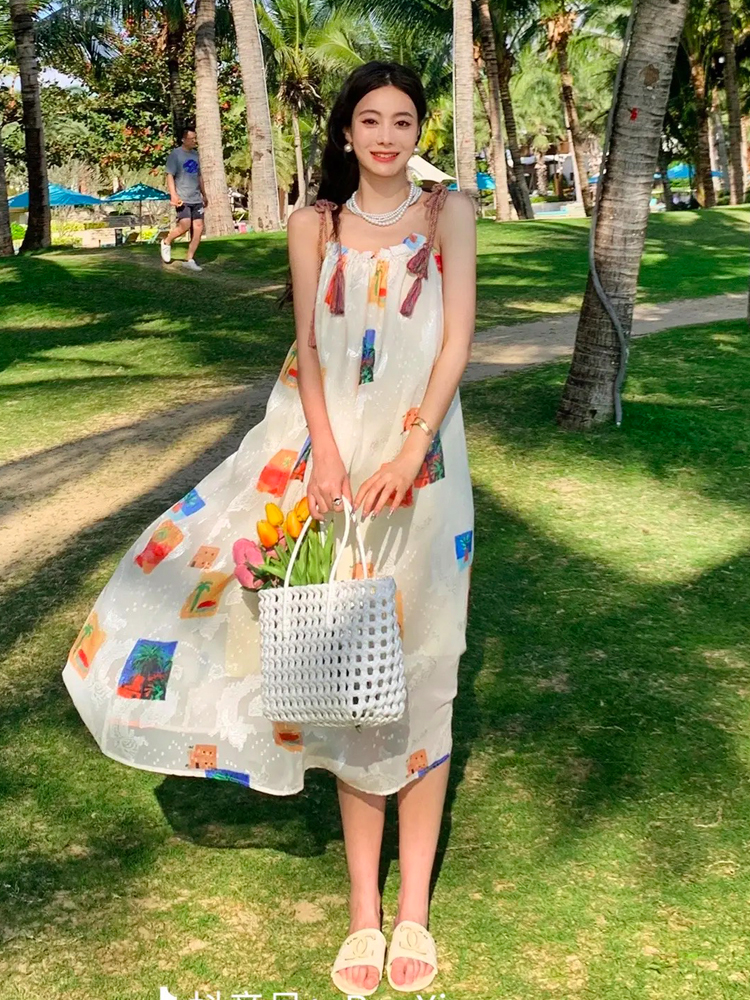 Tea break French high-end sexy seaside vacation floral suspender dress women's summer super fairy loose beach long dress